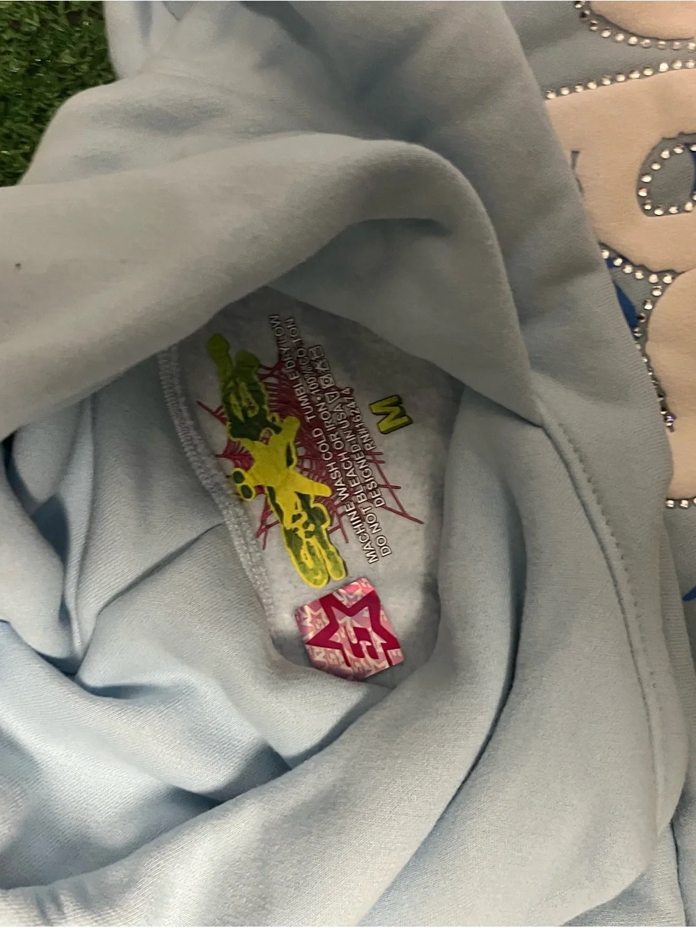 Ed Hardy Light Blue Pullover Hoodie with Spider Web Graphic